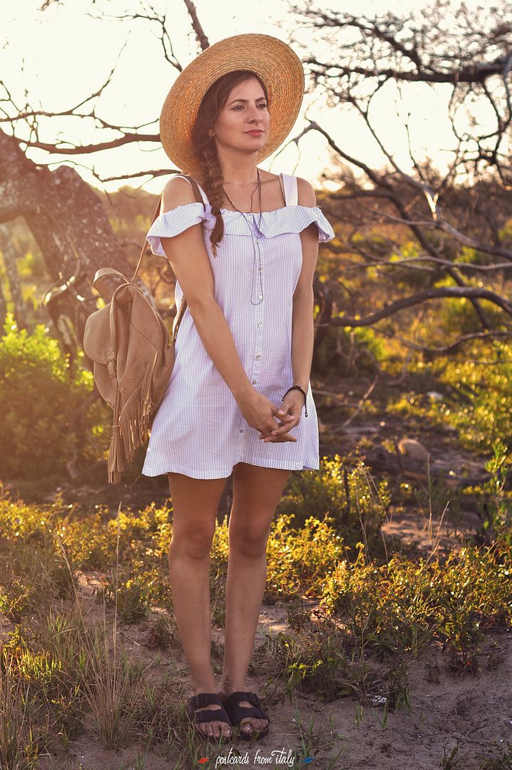 Outfit con vestido off the shoulder y canotier