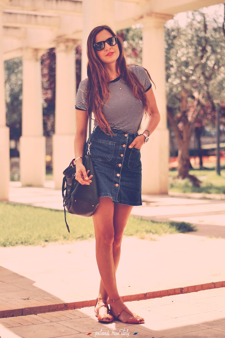 High waisted denim skirt with striped t-shirt and red lips.