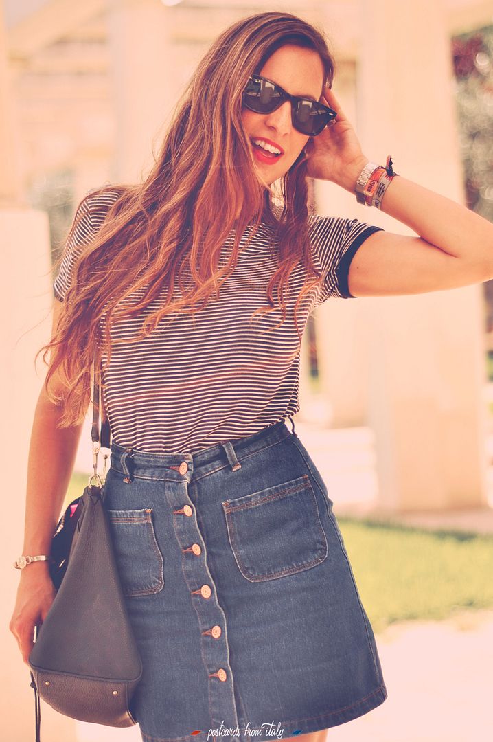 High waisted denim skirt with striped t-shirt and red lips.